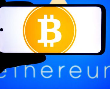 Bitcoin hits highest level since July, boosting other coins and crypto-related stocks