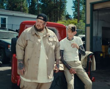 Jelly Roll, MGK and Travis Barker Take ‘Tonight Show’ To Church With Spirited ‘Lonely Road’