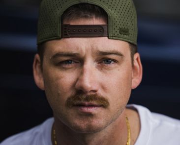 Will Morgan Wallen Be That ‘Somebody’ to Stop Shaboozey’s Reign Atop the Hot 100?