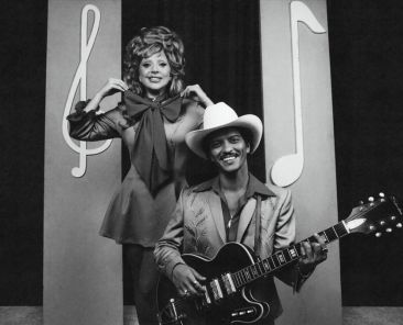 Lady Gaga & Bruno Mars’ ‘Die With a Smile’ Tops Global 200 Chart for 18th Week