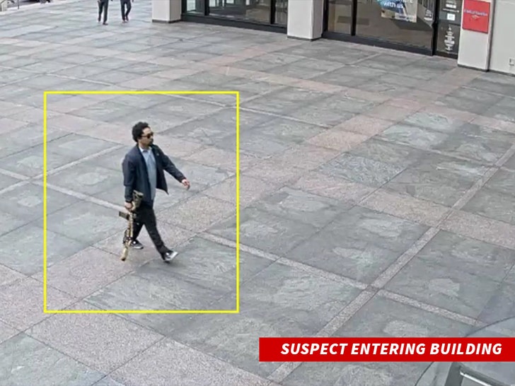 Shane Tamura nyc shooter entering building 1