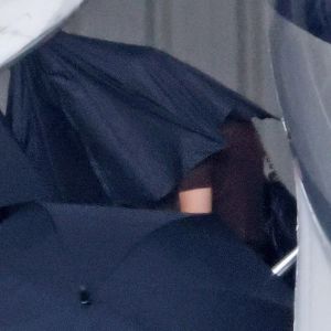 Taylor Swift Lands in California for Selena Gomez's Wedding, Covers Up With Umbrellas