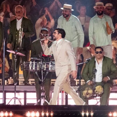 Bad Bunny Slips & Falls During Concert, But His Fans Keep the Show Going for Him