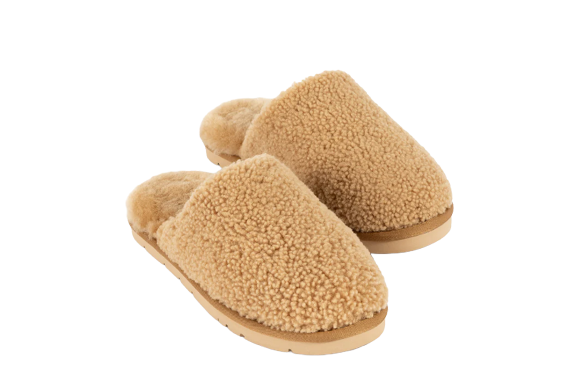 Pair of beige fuzzy slippers with flat soles.