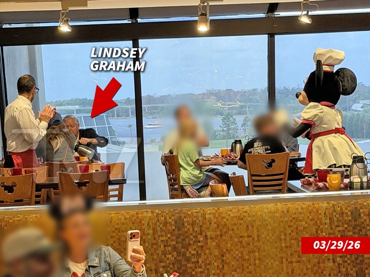 lindsey graham at disney world chef mickey restaurant handout tmz 5