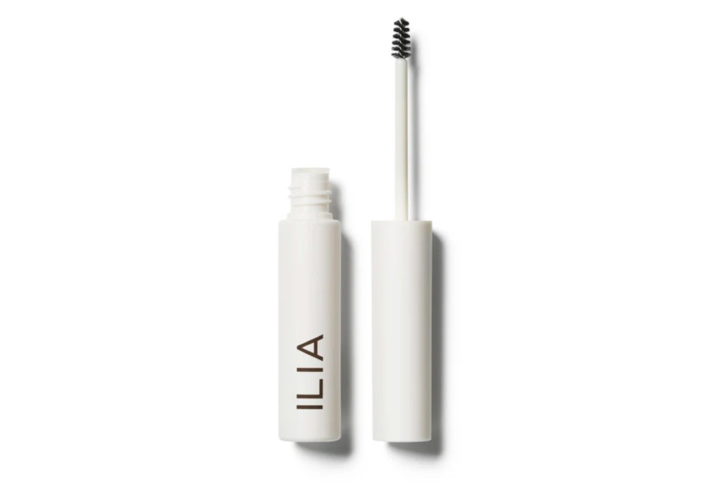 ILIA brand eyebrow gel tube with the wand removed, displaying its brush.