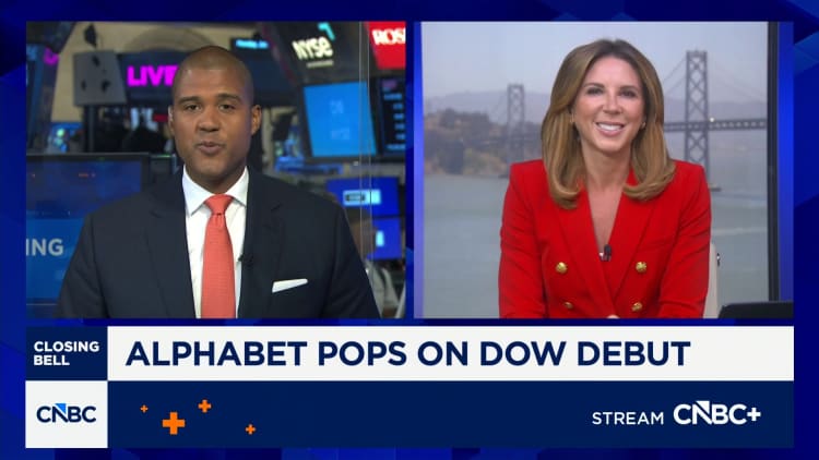 Alphabet surges in Dow debut, helping lift index toward record