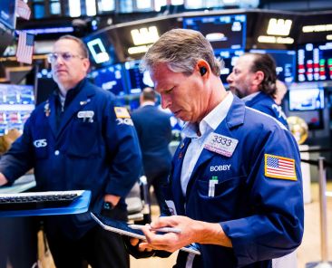 The AI trade cooled and oil sank. A closer look at Wall Street's volatile week