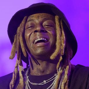 Lil Wayne Required Ex-Assistant to Have 'Pleasant Hygiene,' Roll Blunts, Love Dogs