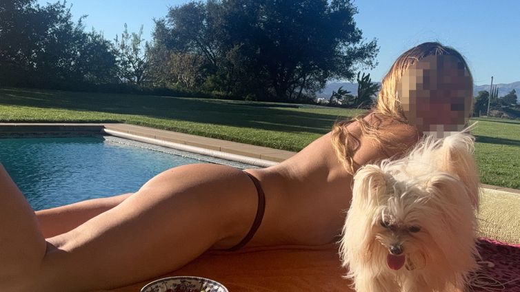 Guess The Topless Babe With Her Puppies Out
